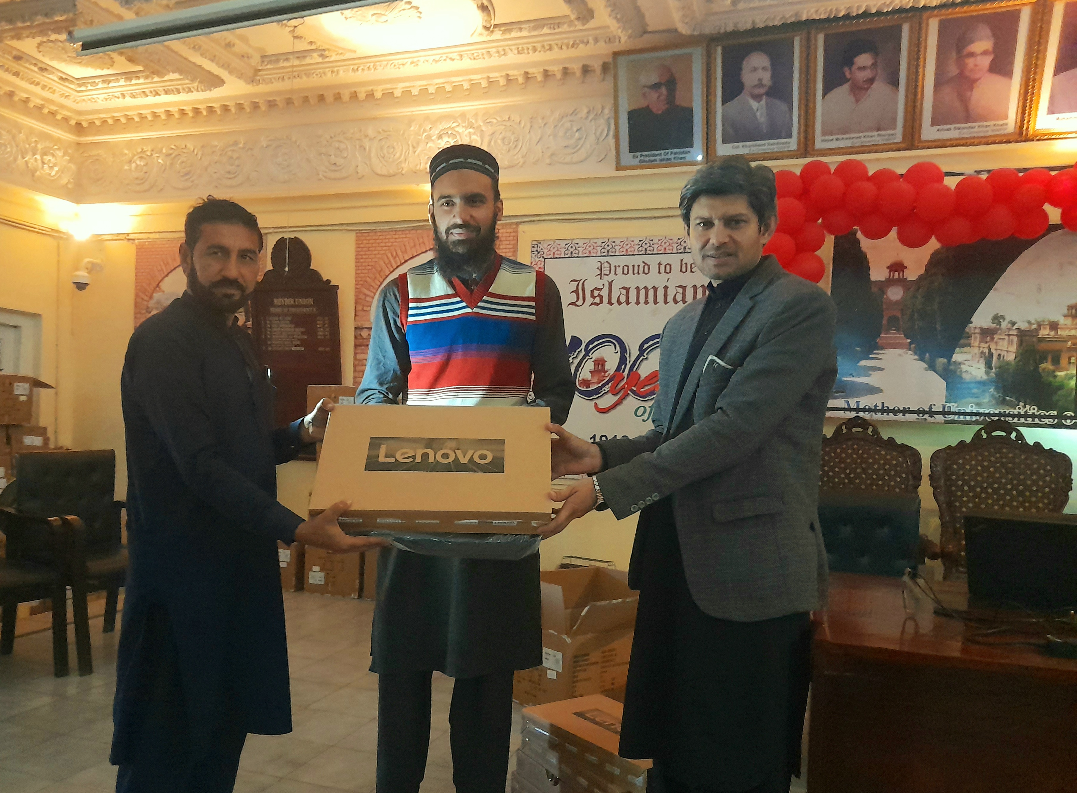 Receiving laptop at Khyber Union Hall, Islamia College Peshawar.